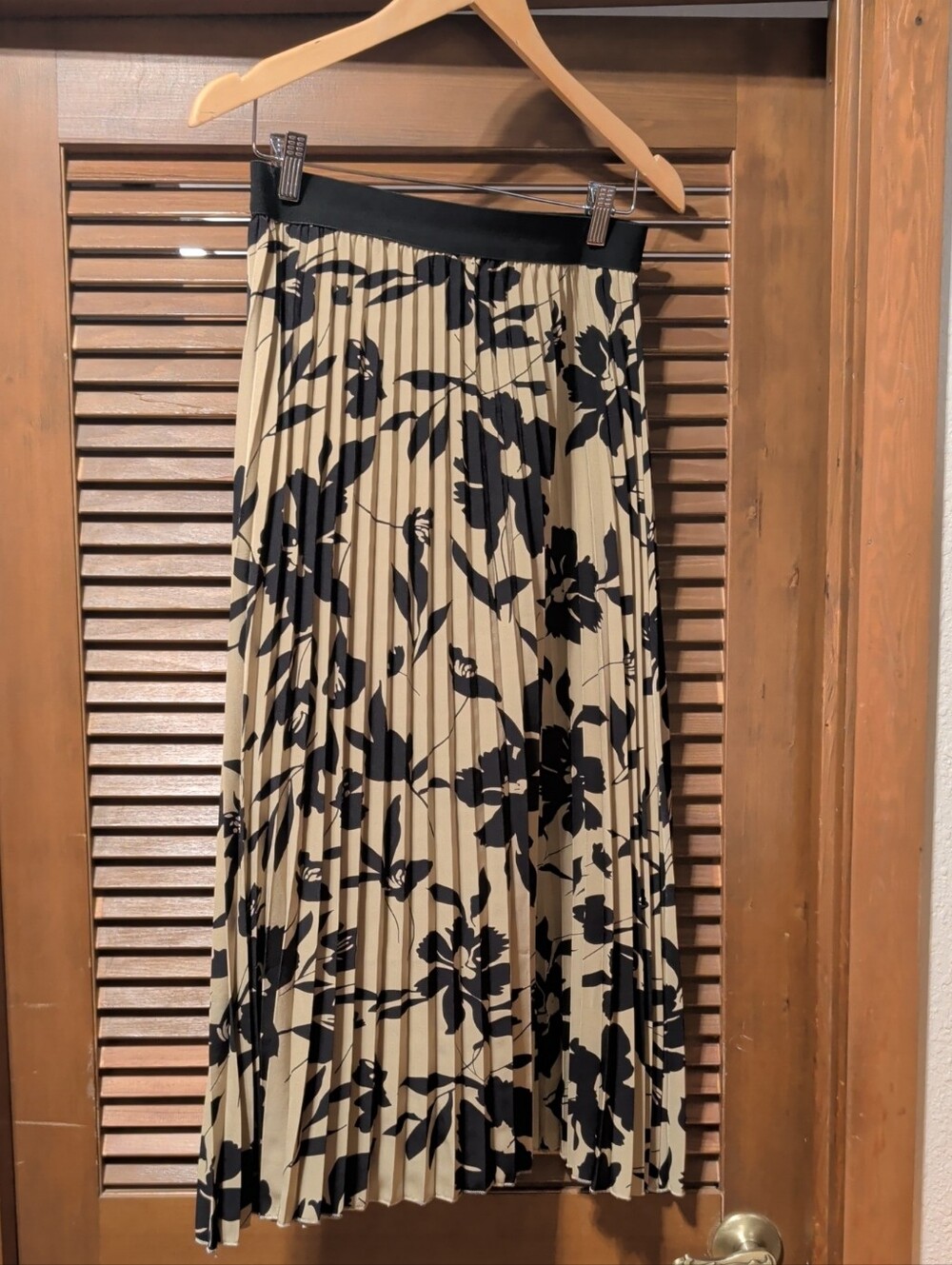 Beige Pleated Midi Skirt with Black Floral Print